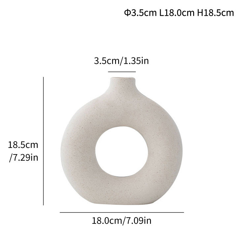 Unglazed spotted ceramic vase simple modern