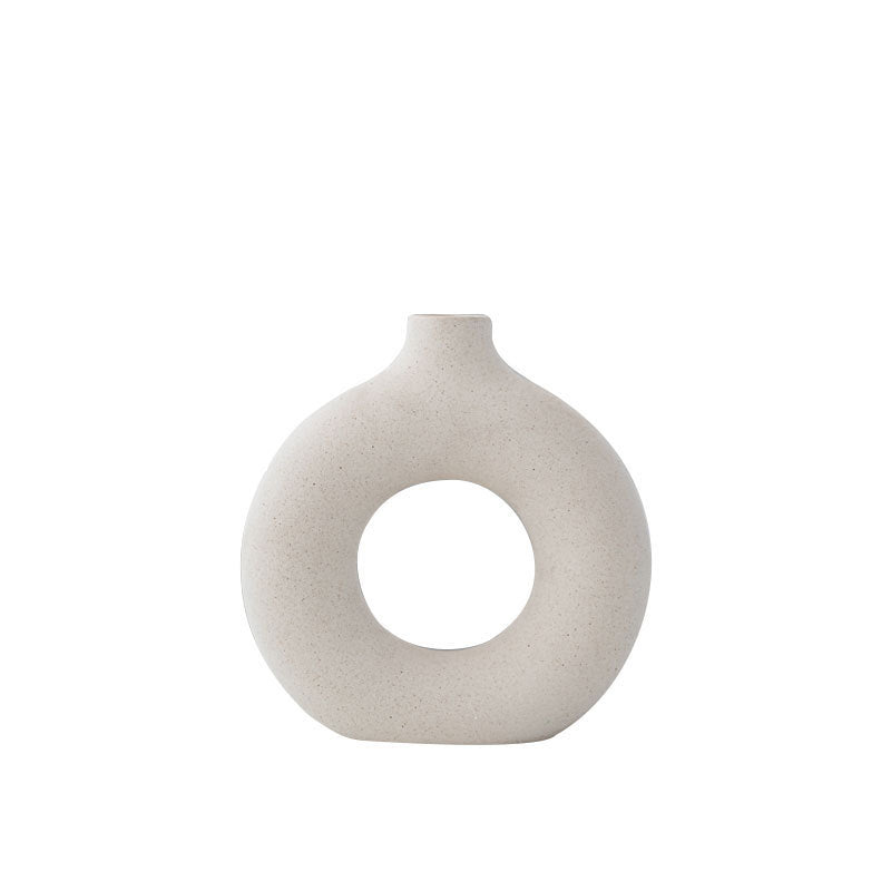 Unglazed spotted ceramic vase simple modern