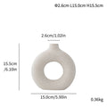 Unglazed spotted ceramic vase simple modern