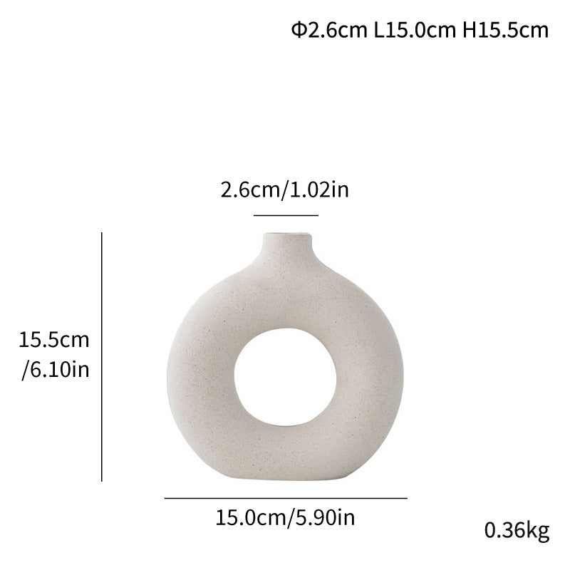 Unglazed spotted ceramic vase simple modern